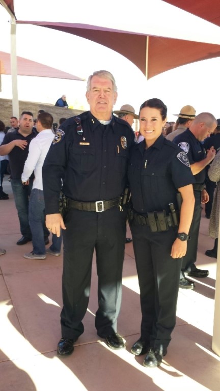 The author and his daughter at her graduation from the Arizona Law Enforcement Academy.